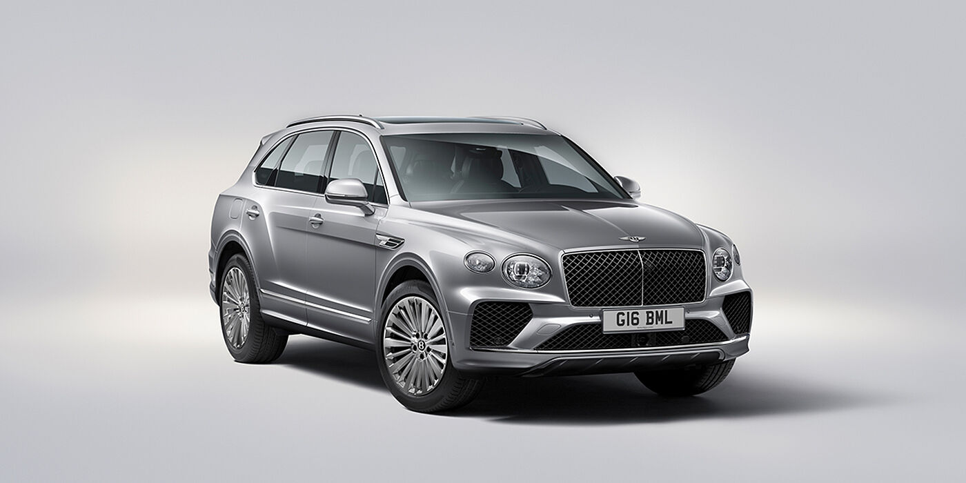 Bentley Firenze Bentley Bentayga luxury SUV front three quarter view in Moonbeam paint with matrix grille and 21″ 5 spoke painted wheels
