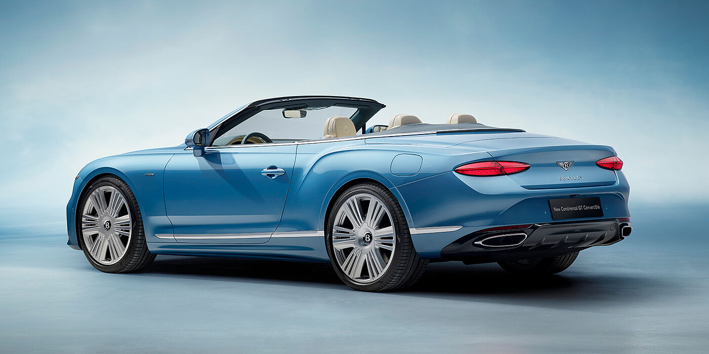 Bentley Firenze New Bentley Continental GTC Azure convertible rear view in Light Windsor blue paint with 22 inch ten spoke wheels and chrome exterior details