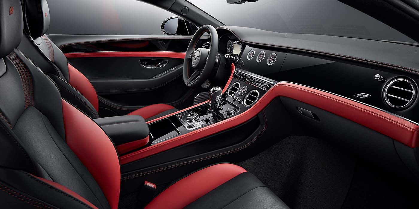 Bentley Firenze Bentley Continental GT S coupe front interior in Beluga black and Hotspur red hide with high gloss Carbon Fibre veneer