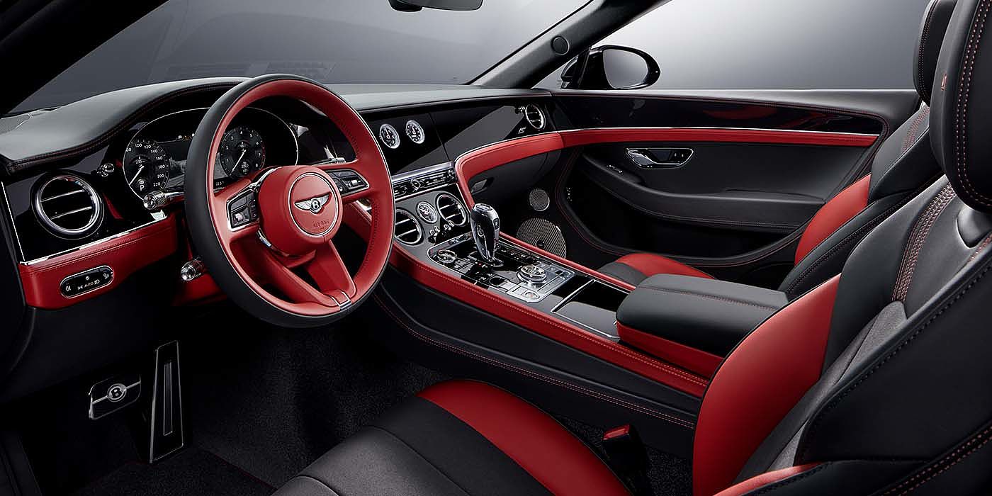 Bentley Firenze Bentley Continental GTC S convertible front interior in Beluga black and Hotspur red hide with high gloss carbon fibre veneer