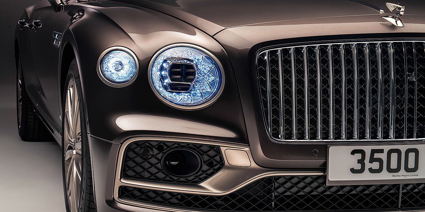 Bentley Firenze Bentley Flying Spur Odyssean sedan front grille and illuminated led lamps with Brodgar brown paint