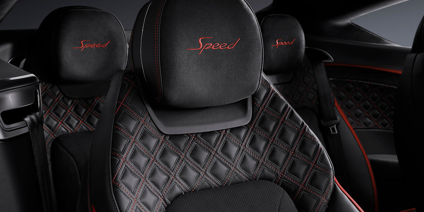 Bentley Firenze Bentley Continental GT Speed coupe seat close up in Beluga black and Hotspur red hide