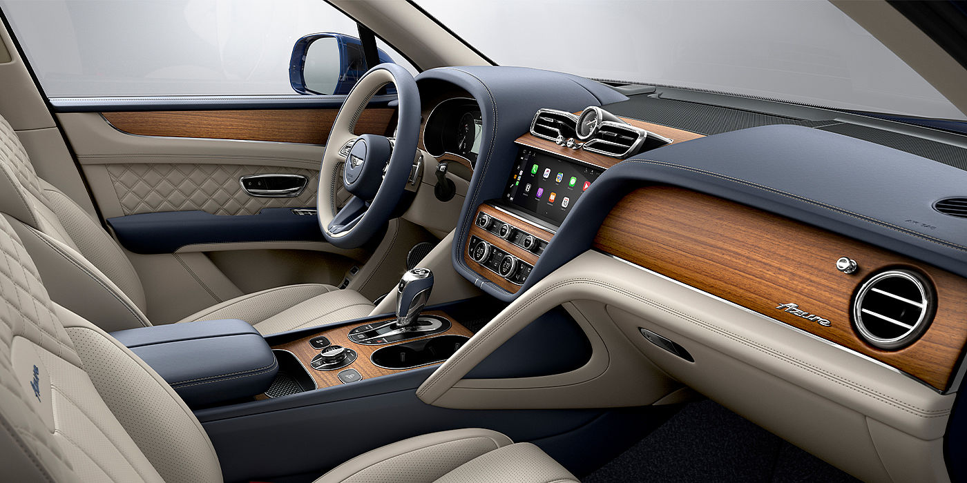 Bentley Firenze Bentley Bentayga Azure SUV front interior in Imperial Blue and Linen hide