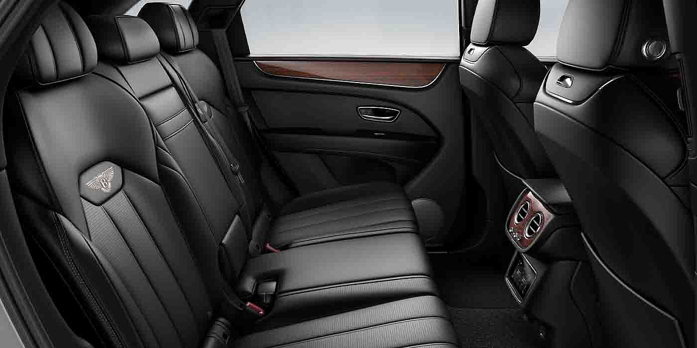 Bentley Firenze Bentley Bentayga EWB interior view for rear passengers with Beluga black hide.
